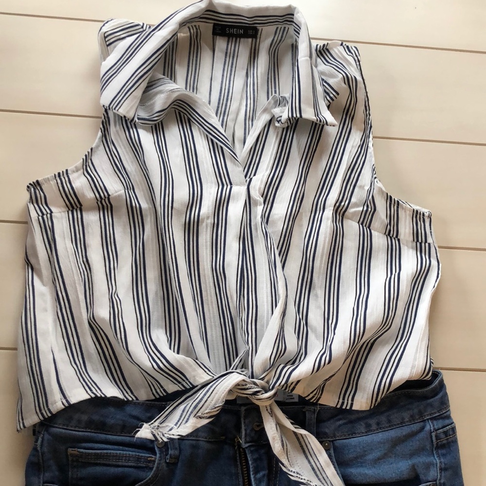 Never worn, brand new, sleeveless, summer top!
